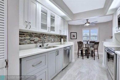 Move right into this tropical paradise of Wynmoor Village! Fully on Wynmoor Golf Course in Florida - for sale on GolfHomes.com, golf home, golf lot
