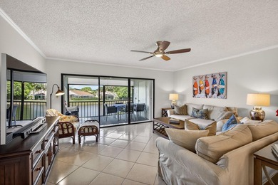 Beautifully updated 2-bedroom, 2-bath second-floor condo on Old Marsh Golf Club in Florida - for sale on GolfHomes.com, golf home, golf lot