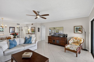 Beautifully updated 2-bedroom, 2-bath second-floor condo on Old Marsh Golf Club in Florida - for sale on GolfHomes.com, golf home, golf lot