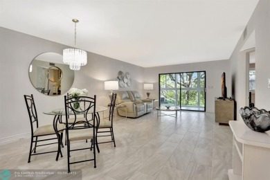 Move right into this tropical paradise of Wynmoor Village! Fully on Wynmoor Golf Course in Florida - for sale on GolfHomes.com, golf home, golf lot