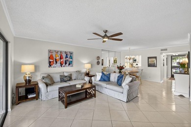 Beautifully updated 2-bedroom, 2-bath second-floor condo on Old Marsh Golf Club in Florida - for sale on GolfHomes.com, golf home, golf lot