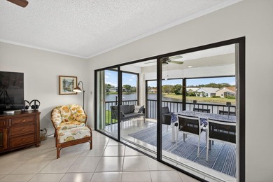 Beautifully updated 2-bedroom, 2-bath second-floor condo on Old Marsh Golf Club in Florida - for sale on GolfHomes.com, golf home, golf lot