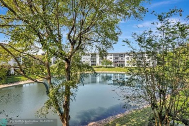 Move right into this tropical paradise of Wynmoor Village! Fully on Wynmoor Golf Course in Florida - for sale on GolfHomes.com, golf home, golf lot