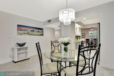 Move right into this tropical paradise of Wynmoor Village! Fully on Wynmoor Golf Course in Florida - for sale on GolfHomes.com, golf home, golf lot