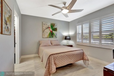 Move right into this tropical paradise of Wynmoor Village! Fully on Wynmoor Golf Course in Florida - for sale on GolfHomes.com, golf home, golf lot