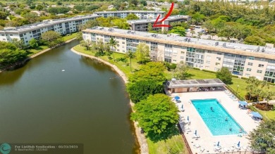 Move right into this tropical paradise of Wynmoor Village! Fully on Wynmoor Golf Course in Florida - for sale on GolfHomes.com, golf home, golf lot