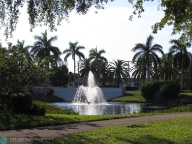 Move right into this tropical paradise of Wynmoor Village! Fully on Wynmoor Golf Course in Florida - for sale on GolfHomes.com, golf home, golf lot