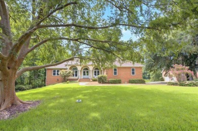 Lovely Lakefront Home! Custom Brick Beauty nestled on Golden on Golden Eagle Country Club in Florida - for sale on GolfHomes.com, golf home, golf lot