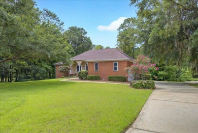 Lovely Lakefront Home! Custom Brick Beauty nestled on Golden on Golden Eagle Country Club in Florida - for sale on GolfHomes.com, golf home, golf lot