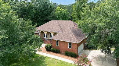 Lovely Lakefront Home! Custom Brick Beauty nestled on Golden on Golden Eagle Country Club in Florida - for sale on GolfHomes.com, golf home, golf lot