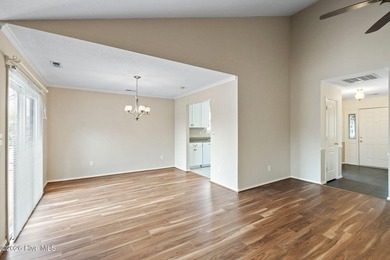 Welcome to this lovely, well-kept three-bedroom, two-bathroom on Olde Point Golf and Country Club in North Carolina - for sale on GolfHomes.com, golf home, golf lot