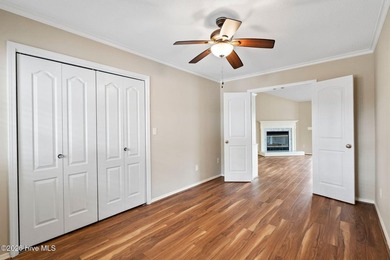 Welcome to this lovely, well-kept three-bedroom, two-bathroom on Olde Point Golf and Country Club in North Carolina - for sale on GolfHomes.com, golf home, golf lot