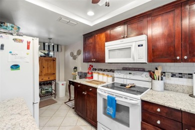 Welcome to your dream 2 bedroom, 2 bath condo in the heart of on Tarpon Springs Golf Course in Florida - for sale on GolfHomes.com, golf home, golf lot