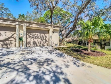 This beautifully updated 2-bedroom, 2-bathroom villa offers on Tarpon Springs Golf Course in Florida - for sale on GolfHomes.com, golf home, golf lot