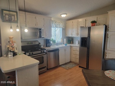 This is a beautifully furnished 3 bedroom 2 bath home. So quaint on 3 Parks Fairways in Arizona - for sale on GolfHomes.com, golf home, golf lot