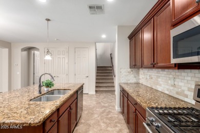 Exceptionally clean and move-in ready home is on quiet street in on Verrado Golf Club  in Arizona - for sale on GolfHomes.com, golf home, golf lot
