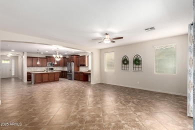 Exceptionally clean and move-in ready home is on quiet street in on Verrado Golf Club  in Arizona - for sale on GolfHomes.com, golf home, golf lot