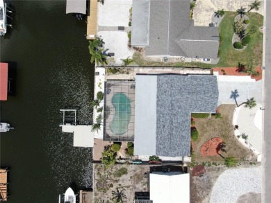 Waterfront luxury in Apollo Beach with no HOA, no CDD, and on Apollo Beach Golf and Sea Club in Florida - for sale on GolfHomes.com, golf home, golf lot