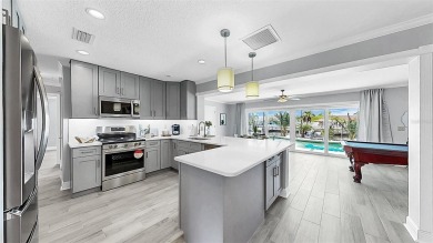 Waterfront luxury in Apollo Beach with no HOA, no CDD, and on Apollo Beach Golf and Sea Club in Florida - for sale on GolfHomes.com, golf home, golf lot