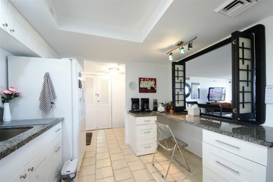 Enjoy breathtaking panoramic views from this beautifully on The President Country Club in Florida - for sale on GolfHomes.com, golf home, golf lot