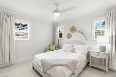 Enjoy breathtaking golf course and lake views from this on Quail Run Golf Club In Naples in Florida - for sale on GolfHomes.com, golf home, golf lot