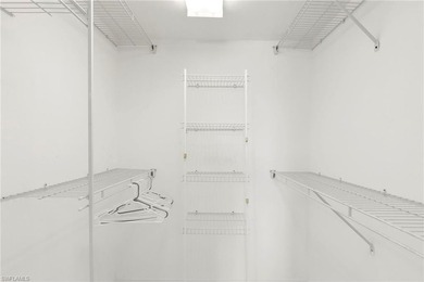 Enjoy breathtaking golf course and lake views from this on Quail Run Golf Club In Naples in Florida - for sale on GolfHomes.com, golf home, golf lot