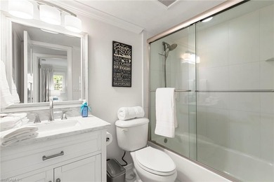 Enjoy breathtaking golf course and lake views from this on Quail Run Golf Club In Naples in Florida - for sale on GolfHomes.com, golf home, golf lot