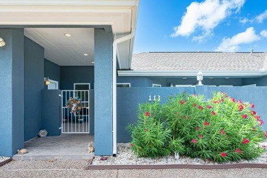 Fairway Living with a Private Courtyard Oasis Nestled along the on Rockport Country Club in Texas - for sale on GolfHomes.com, golf home, golf lot