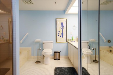 Enjoy breathtaking panoramic views from this beautifully on The President Country Club in Florida - for sale on GolfHomes.com, golf home, golf lot