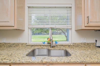 Fairway Living with a Private Courtyard Oasis Nestled along the on Rockport Country Club in Texas - for sale on GolfHomes.com, golf home, golf lot