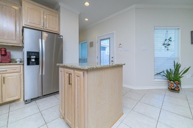 Fairway Living with a Private Courtyard Oasis Nestled along the on Rockport Country Club in Texas - for sale on GolfHomes.com, golf home, golf lot