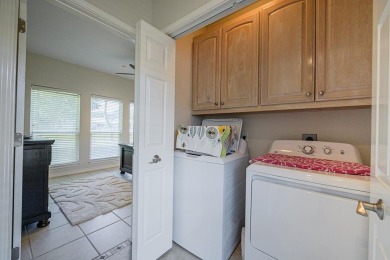 Fairway Living with a Private Courtyard Oasis Nestled along the on Rockport Country Club in Texas - for sale on GolfHomes.com, golf home, golf lot