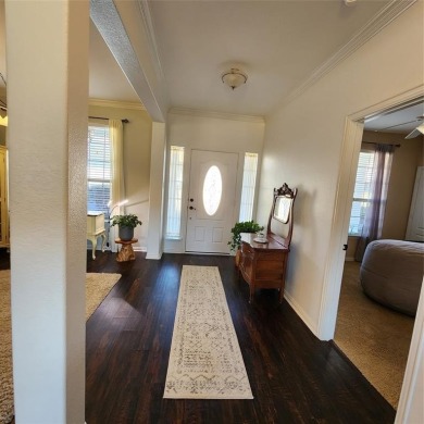 Immaculate riverfront home with a gradual slope yard to the on Pecan Plantation Country Club in Texas - for sale on GolfHomes.com, golf home, golf lot