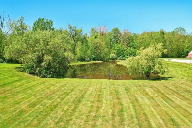 This stunning single-family Condo home offers the perfect blend on Hickory Hollow Golf Course in Michigan - for sale on GolfHomes.com, golf home, golf lot