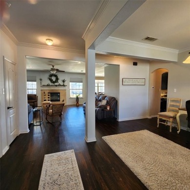 Immaculate riverfront home with a gradual slope yard to the on Pecan Plantation Country Club in Texas - for sale on GolfHomes.com, golf home, golf lot