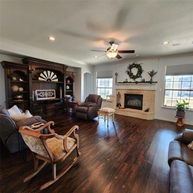 Immaculate riverfront home with a gradual slope yard to the on Pecan Plantation Country Club in Texas - for sale on GolfHomes.com, golf home, golf lot