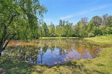 This stunning single-family Condo home offers the perfect blend on Hickory Hollow Golf Course in Michigan - for sale on GolfHomes.com, golf home, golf lot