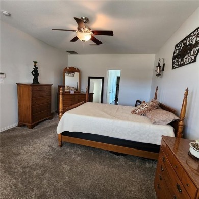 Immaculate riverfront home with a gradual slope yard to the on Pecan Plantation Country Club in Texas - for sale on GolfHomes.com, golf home, golf lot