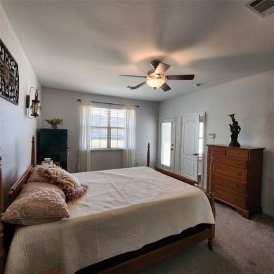 Immaculate riverfront home with a gradual slope yard to the on Pecan Plantation Country Club in Texas - for sale on GolfHomes.com, golf home, golf lot