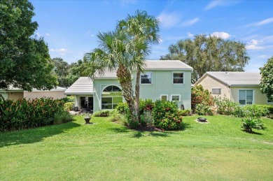 Charming 3-bedroom, 2.5-bath home at 9226 SE Wild Pine Pl on Riverbend Golf Club in Florida - for sale on GolfHomes.com, golf home, golf lot