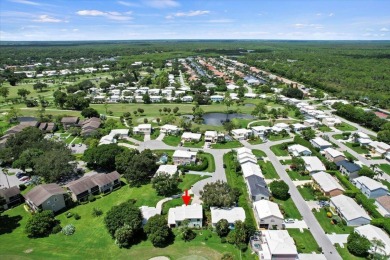 Charming 3-bedroom, 2.5-bath home at 9226 SE Wild Pine Pl on Riverbend Golf Club in Florida - for sale on GolfHomes.com, golf home, golf lot