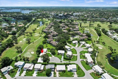 Charming 3-bedroom, 2.5-bath home at 9226 SE Wild Pine Pl on Riverbend Golf Club in Florida - for sale on GolfHomes.com, golf home, golf lot