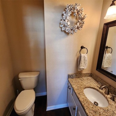 Immaculate riverfront home with a gradual slope yard to the on Pecan Plantation Country Club in Texas - for sale on GolfHomes.com, golf home, golf lot