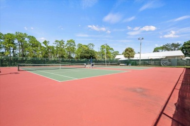 Charming 3-bedroom, 2.5-bath home at 9226 SE Wild Pine Pl on Riverbend Golf Club in Florida - for sale on GolfHomes.com, golf home, golf lot