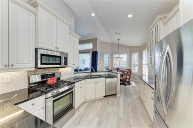 Discover Paradise on the Fairway: Your Dream Pool Home Awaits! on Ritz-Carlton Members Golf Club in Florida - for sale on GolfHomes.com, golf home, golf lot