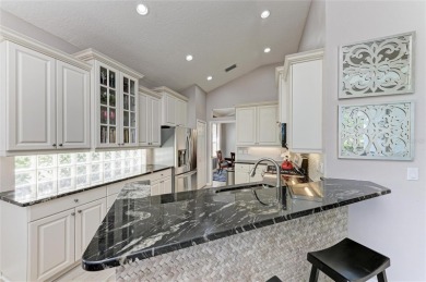 Discover Paradise on the Fairway: Your Dream Pool Home Awaits! on Ritz-Carlton Members Golf Club in Florida - for sale on GolfHomes.com, golf home, golf lot