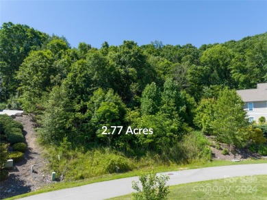 Located in the Reems Creek Golf Community, this 2.77-acre lot on Reems Creek Golf Club in North Carolina - for sale on GolfHomes.com, golf home, golf lot