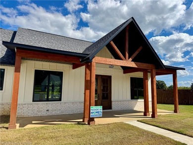 Welcome to East Village! This thoughtfully designed 3-bedroom, 2 on Vache-Grasse Country Club in Arkansas - for sale on GolfHomes.com, golf home, golf lot