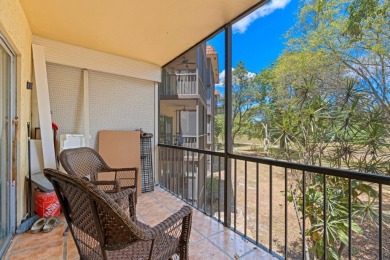 GORGEOUS & PRISTINE WATERFRONT CONDO! PRESTIGIOUS THE FALLS OF on Inverrary Country Club in Florida - for sale on GolfHomes.com, golf home, golf lot