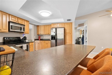 Welcome to this stunning 3-bedroom, 2-bathroom pool home on Oak Hills Country Club in Florida - for sale on GolfHomes.com, golf home, golf lot